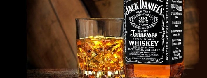 Bottle of Jack Daniels and a snifter of whiskey