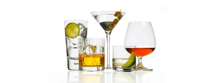 Product photography of various liquors in different glasses.